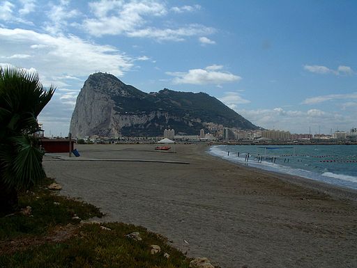 The Rock of Gibraltar viewed from La Linea, its meeting point with Spain, with the open sea visible beyond